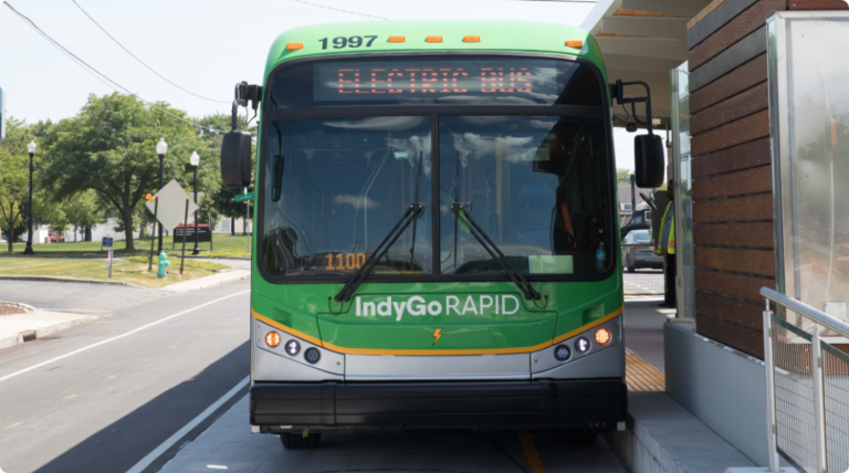 An IndyGo bus waiting at a Super Stop.