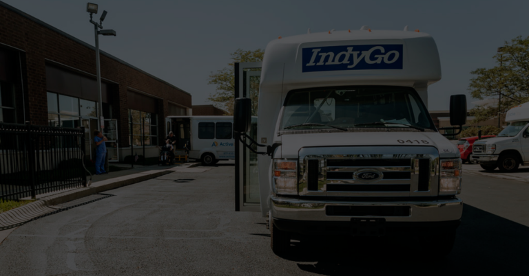 Indygo Paratransit Service Bus with doors open in parking lot